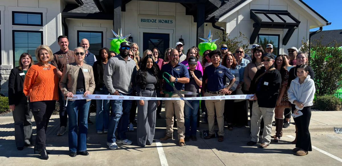 Ribbon cutting held for Bridge Homes
