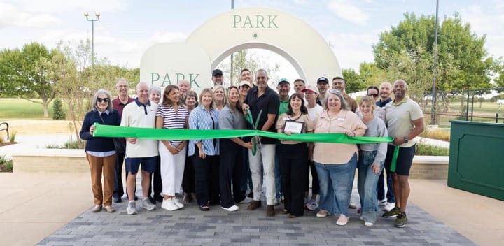 Photo of a ribbon cutting.